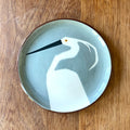 Little egret facing left